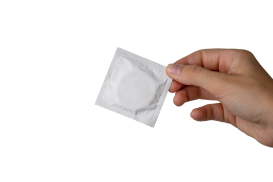 A package of white condom in a girl's hand. PNG