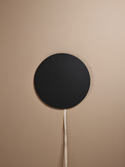 black circle logo mockup on brown wall, perfect for cafe logo