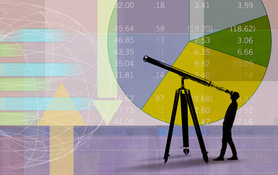 Man looking through telescope at financial figures