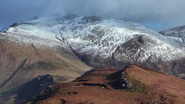 Drone footage of snowy mountain top in Dingle, Ireland, 4K Mavic 3 Pro