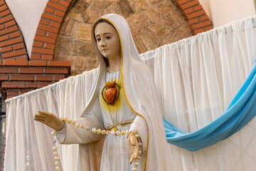 Statue of the image of Our Lady of Fatima, mother of God in the Catholic religion, Our Lady of the Rosary of Fatima, Virgin Mary on the altar in Brazil