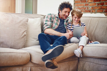 Happy, dad and girl with tablet in sofa at home for elearning, child development and knowledge with...