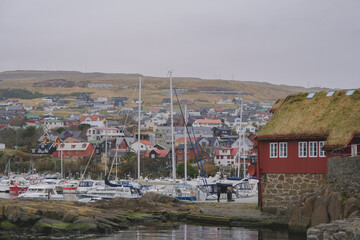 Romantic backstreet, side street and alleys in historic old town of Thorshavn, Faroe Islands with...