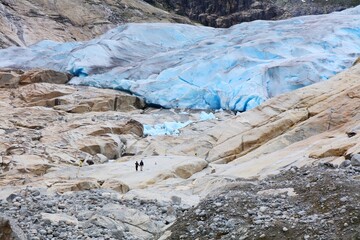 Tourists in Nigardsbreen Glacier in Norway