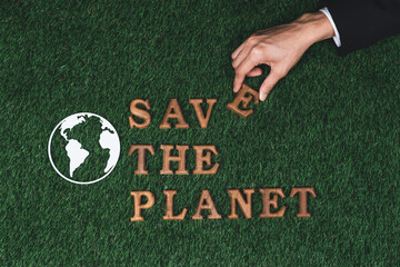 Eco awareness campaign for Earth day concept showcase message arranged in Save Earth on biophilic...