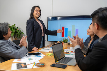 The businesswoman presented her work at the meeting.