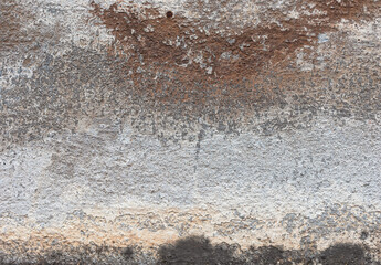 Old wall with shabby damaged plaster. Abstract grunge background texture