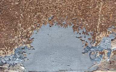 Old wall with shabby damaged plaster. Abstract grunge background texture
