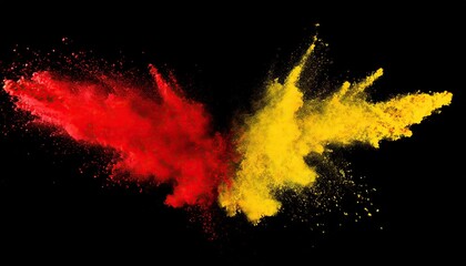 Red and yellow colored powder explosions on black background. Holi paint powder splash
