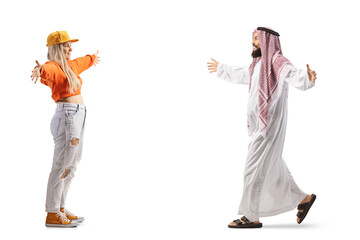 Full length profile shot of a young female meeting a muslim male friend