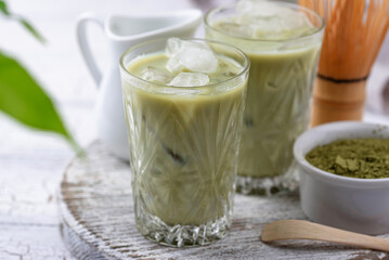 Cold matcha tea with milk and ice