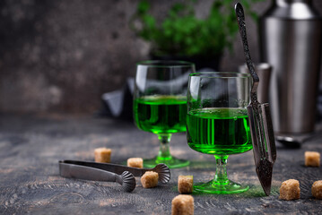 Glass of absinthe with cane sugar