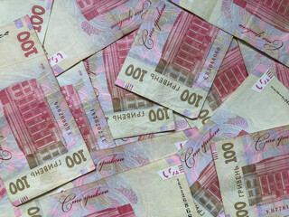 Background made of 100 hryvnia banknotes. Ukrainian money. Currency.