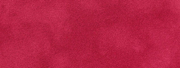 Dark red background of suede fabric material, closeup. Velvet texture of seamless wine textile,...