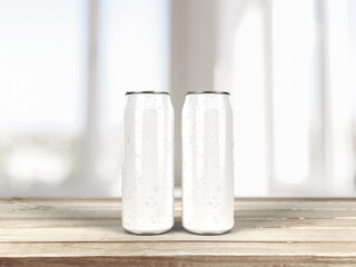 Blank Drinks Cans on a wooden table with blurred background.
