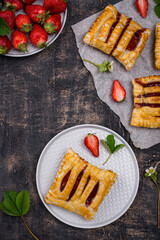 Sweet puff pastry cakes with strawberry
