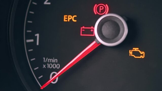 Dashboard with odometer arrow that rises when the vehicle engine is started. Starting the car's engine.