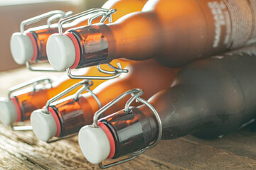 Brown beer bottles with Bugel plugs: sealing flavor, capturing tradition
