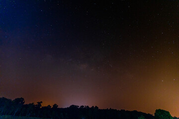 Abstract background of celestial stars, blurred wallpaper of the Milky Way at night, is a natural beauty. Seen during the time of the season