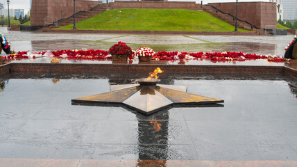 Eternal Flame on Poklonnaya Hill in Moscow, Russia. May rainy day.	

