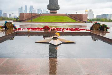 Eternal Flame on Poklonnaya Hill in Moscow, Russia. May rainy day.	
