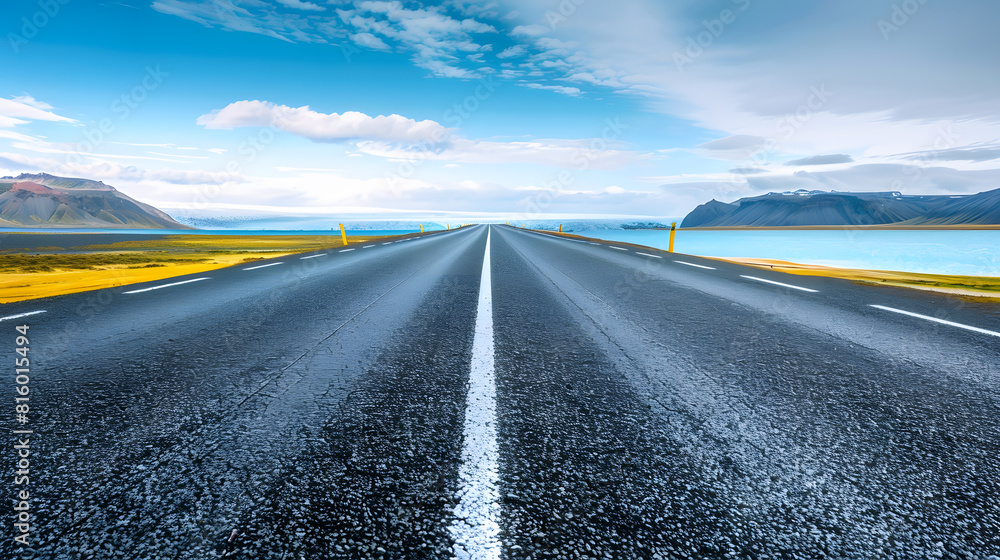 Poster diminishing perspective of asphalt empty roadway with road markings passing through scenic lake agai