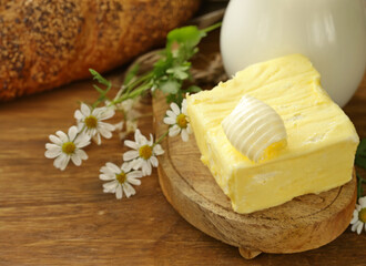organic dairy product butter on wooden background