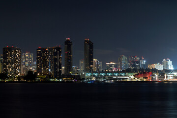 Fototapeta premium the iconic and breathtaking skyline of San Diego downtown at night. With a thousand lights on the big Towers