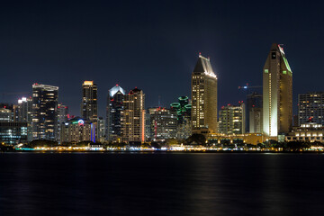 the iconic and breathtaking skyline of San Diego downtown at night. With a thousand lights on the...