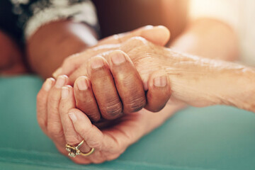 Holding hands, support and senior people with empathy, love and care at a retirement home with...