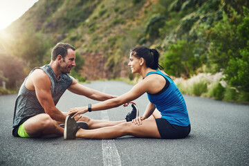 Fitness, health and couple for stretch before running for marathon preparation outdoor on street....