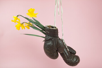 a pair of old boxing gloves hacked to become a vase