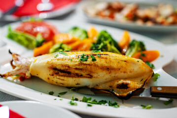 Squid stuffed with cheese and vegetables.