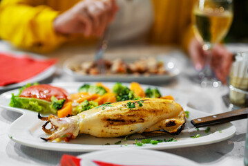 Squid stuffed with cheese and vegetables.