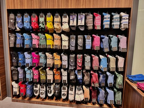 Moscow, Russia, May 15, 2024, AVIAPARK SHOPPING CENTER.COLORFUL SOCK DISPLAY RACK IN RETAIL STORE. ORGANIZED WALL OF FALKE BRAND SOCKS IN VARIOUS COLORS AND STYLES.
