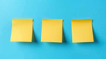 Three yellow sticky notes arranged randomly on a vibrant blue background, symbolizing organization and reminders..