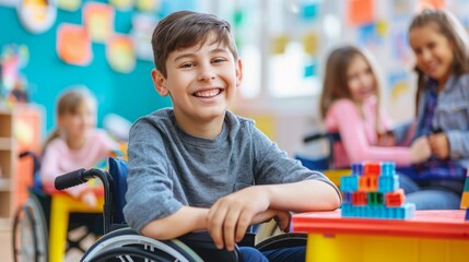A boy in a wheelchair is smiling in front of a classroom full of students and a teacher.
