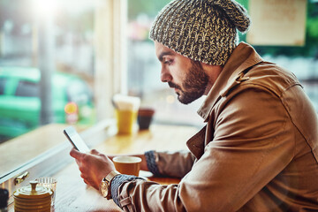 Mobile phone, coffee and man in cafe for social media, communication or networking. Lens flare,...