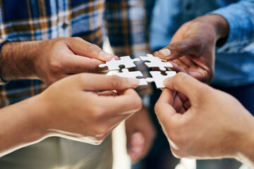 Puzzle, company and hands for collaboration, planning and teamwork for hope and goals. Partnership, connection and trust for business, solutions and vision for support, idea and investment for people