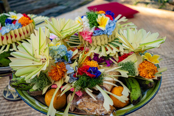 ceremonial offering with colorful flowers