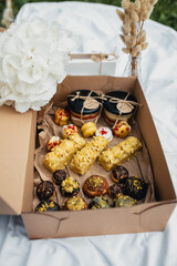 Sweet Blooms: A Box of Pastries and Flowers