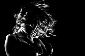 Fototapeta premium Young dancer mid-performance, capturing the raw emotion and physical grace as they express themselves through movement
