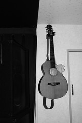 wall-mounted guitar