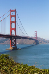 the unique and world famous Golden Gate Bridge at a clear sky sunny morning in san francisco