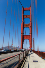 the unique and world famous Golden Gate Bridge at a clear sky sunny morning in san francisco