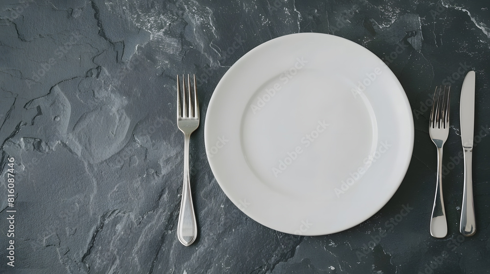 Poster An empty white plate with a fork and a knife overhead flat lay shot on a slate background the concept of dinner : Generative AI