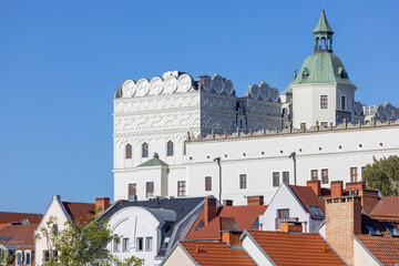 View of the tops of colorful tenement houses, Ducal Castle in the background, Szczecin, Poland © mychadre77