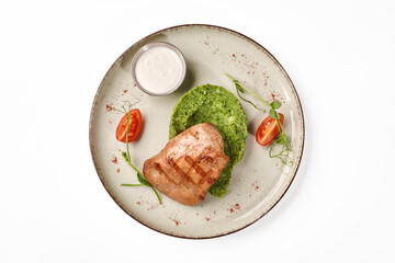 Grilled chicken breast with broccoli puree and sauce