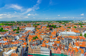 Bruges cityscape, aerial panoramic view of Bruges historical city centre with old traditional colourful Flemish style buildings, skyline horizon panorama of Brugge old town, Flemish region, Belgium