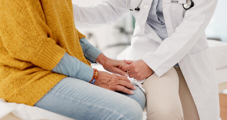 Holding hands, closeup or doctor with patient in consultation for healthcare advice or checkup at hospital. Support, cancer therapy or medical worker talking to person in appointment for medicare